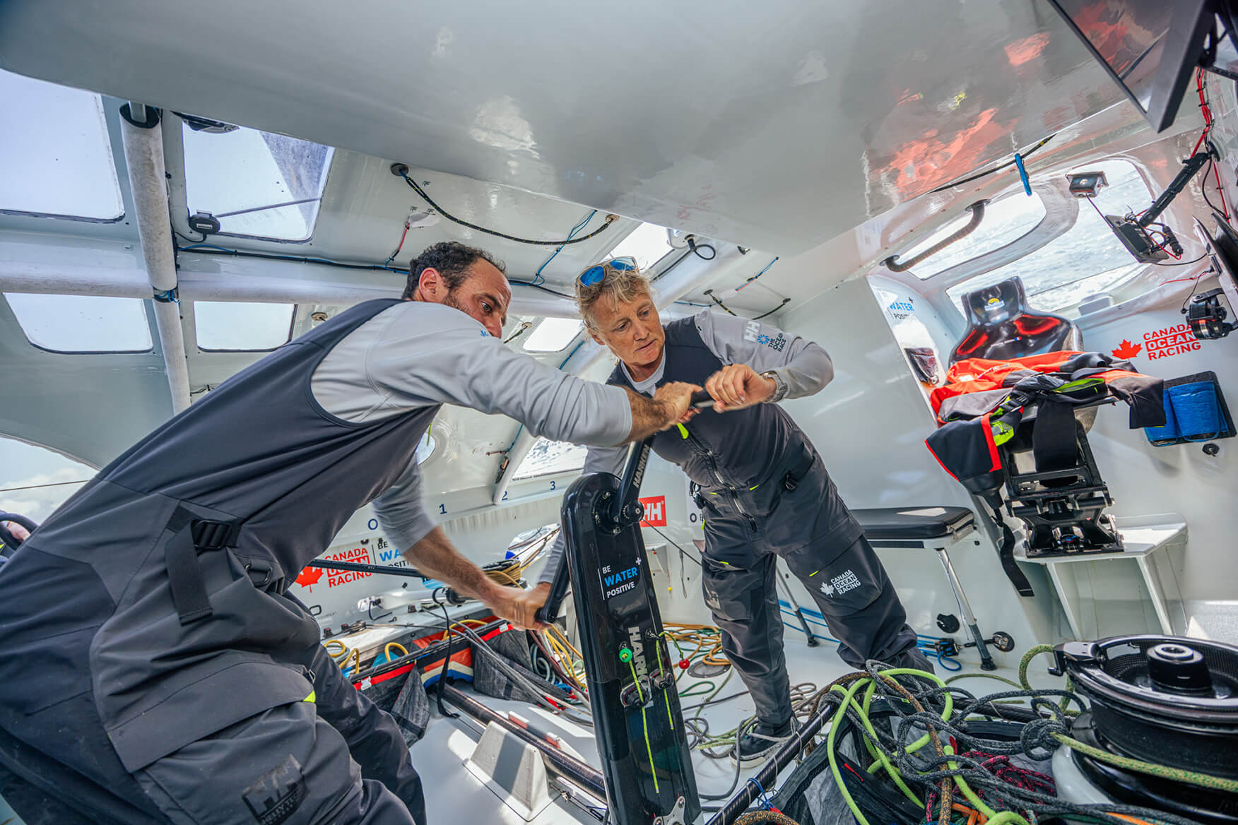 The crew of Canada Ocean Racing – Team Be Water Positive at work