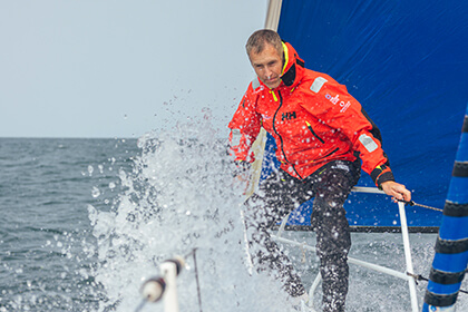 Sailor on deck of a sailing boat