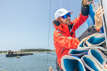 Sailor on deck of a sailing boat