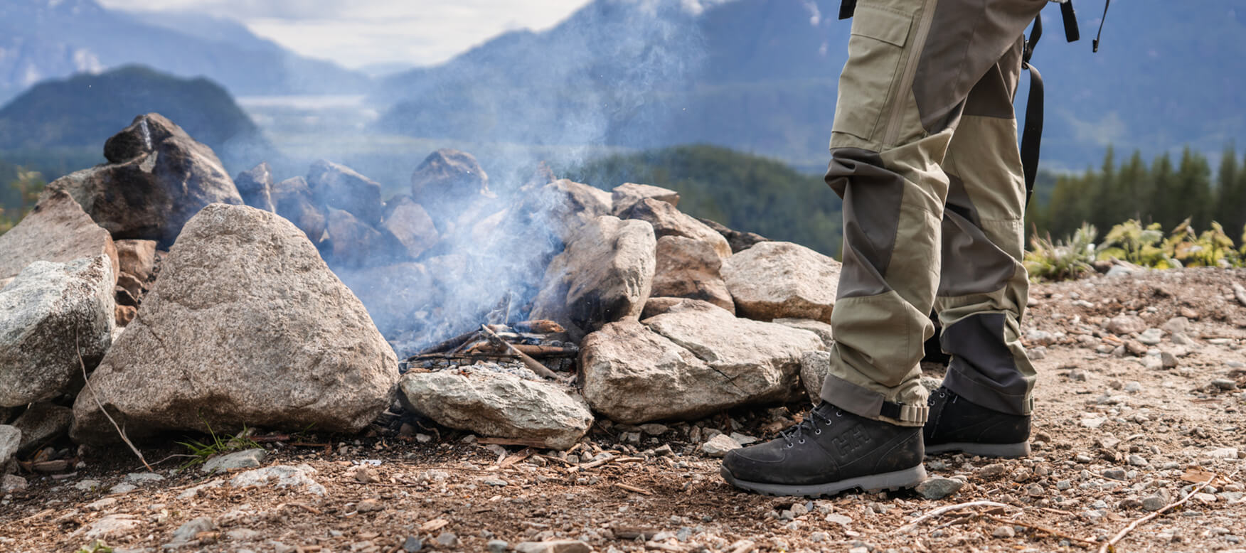 leather shoes by an outdoor fire
